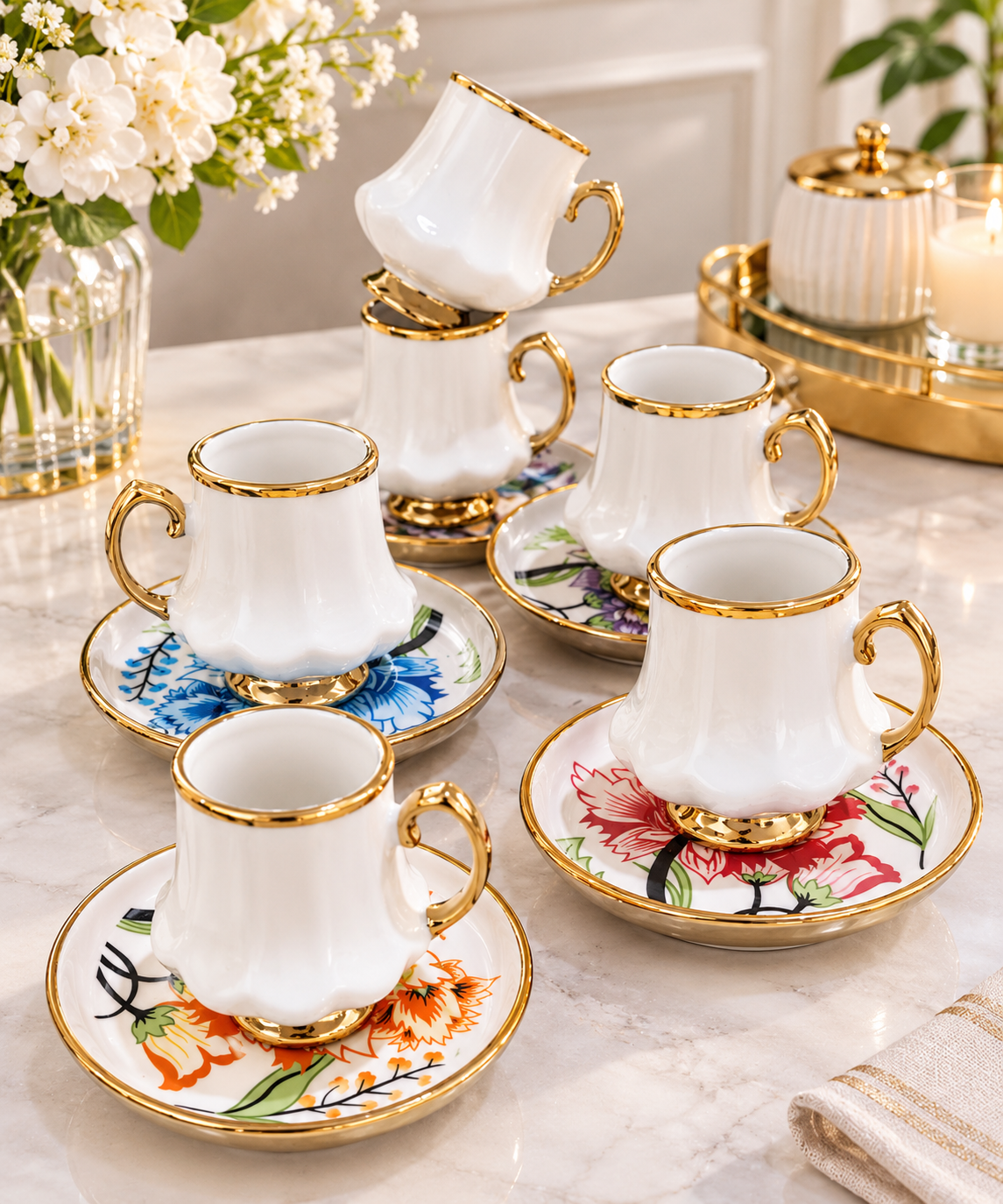 Elegant Coffee Cup Set with Floral Saucers and a Gold Touch
