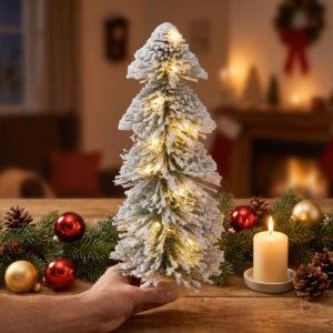 Snow-Covered Christmas Tree with Lights